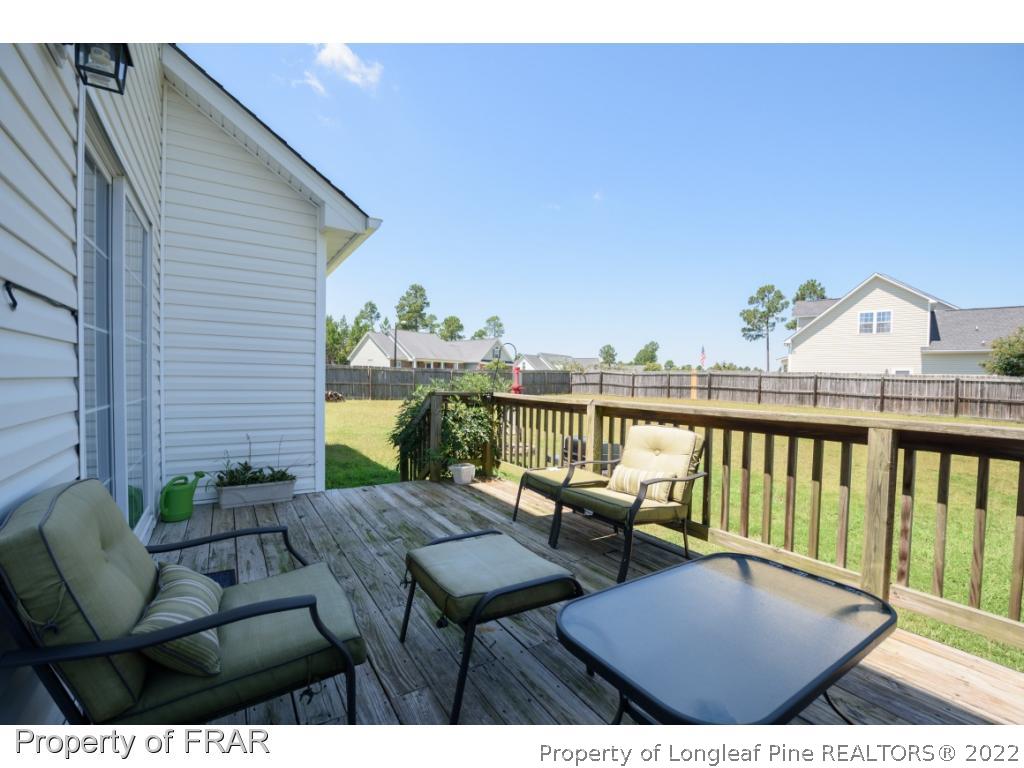 11 Lattimore Road Cameron, NC 28326 - Photo 26 of 28 a view of balcony with furniture and wooden floor