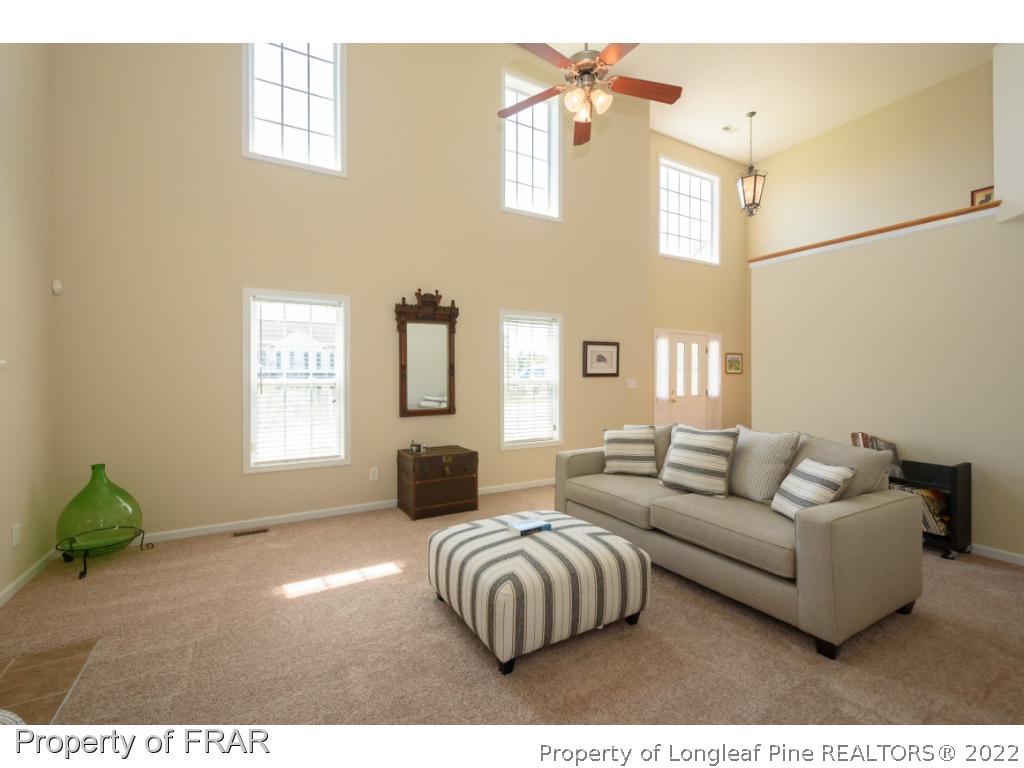 11 Lattimore Road Cameron, NC 28326 - Photo 6 of 28 a living room with furniture and a window
