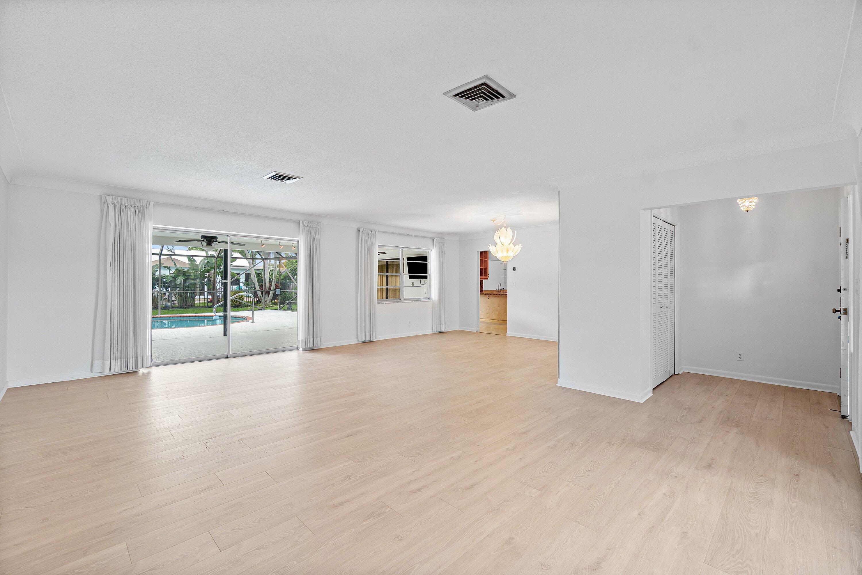 1350 Southwest 13th Place Boca Raton, FL 33486 - Photo 3 of 27 a view of an empty room with a window