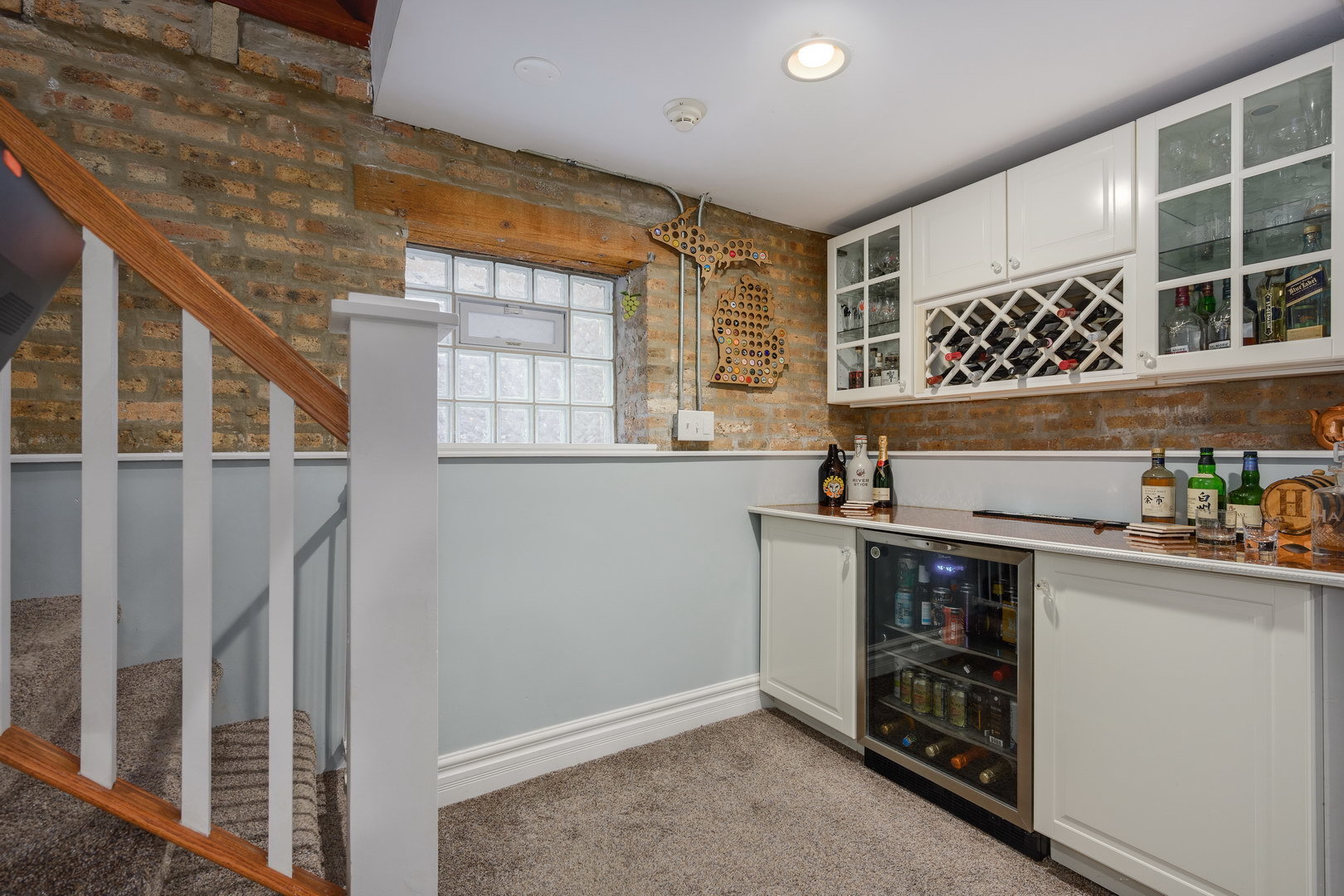 2249 West Leland Avenue Chicago, IL 60625 - Photo 26 of 40 a kitchen with stainless steel appliances a stove and a refrigerator