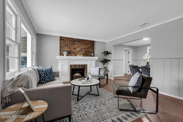 a bathroom with a toilet sink and a mirror