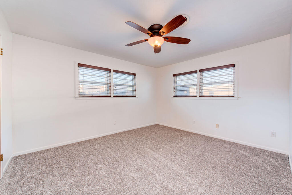 4406 26th Street Lubbock, TX 79410 - Photo 14 of 22 a view of an empty room with a window
