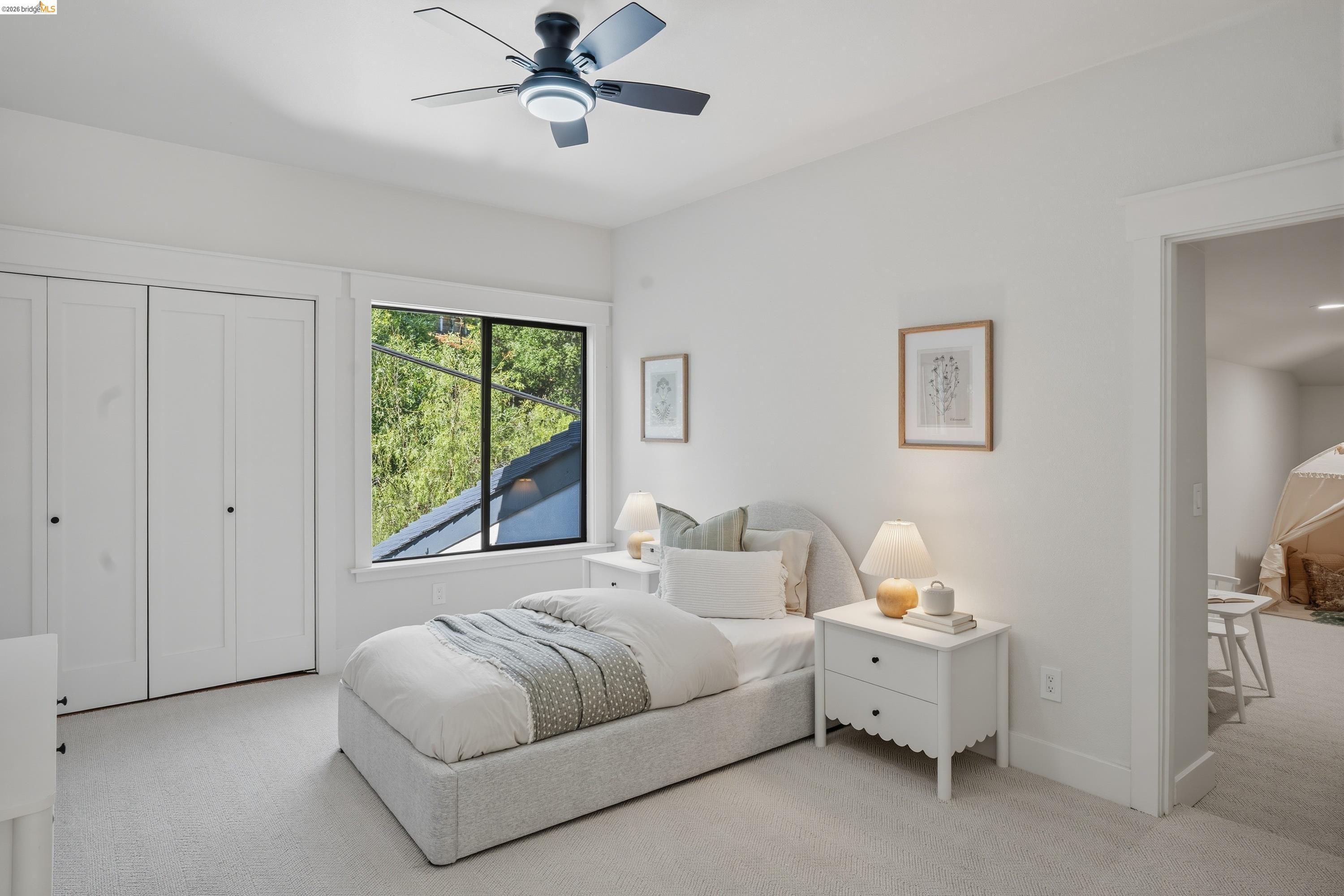 4120 Happy Valley Road Lafayette, CA 94549 - Photo 30 of 48 Bright bedroom featuring a large window, integrated ceiling fan with lighting, ample closet space, and plush carpeting