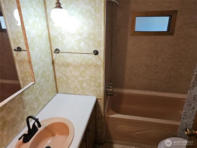 a view of a house with a tree