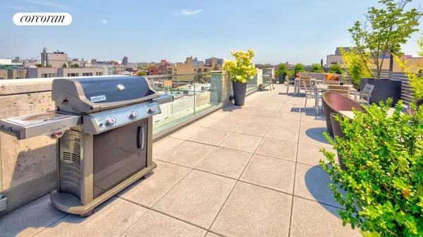 a view of a terrace with seating space