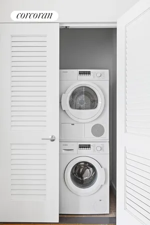 a utility room with dryer and washer