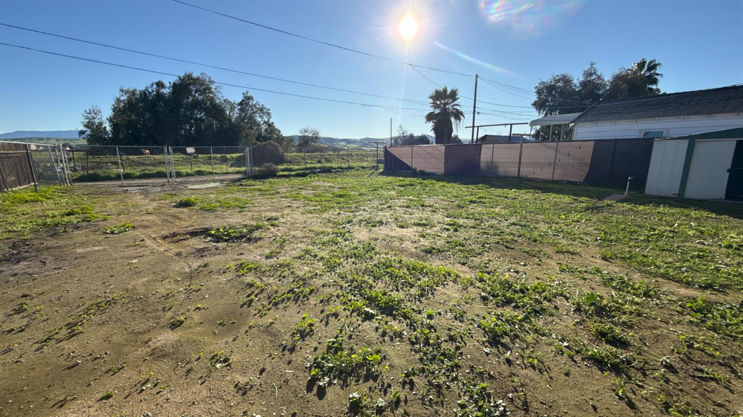 720 East Pleasant Street Coalinga, CA 93210 - Photo 14 of 18 a view of a yard with an outdoor space