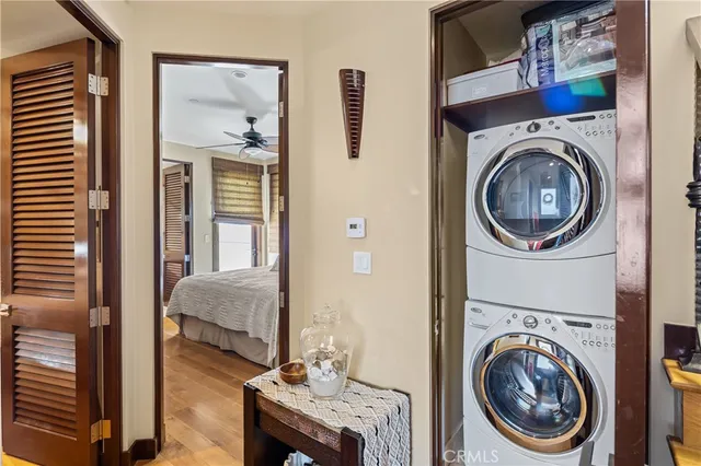 a view of a bedroom and utility room