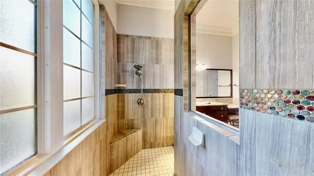 a very nice looking living room with wooden floor and a window