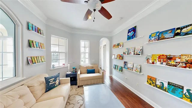 a room with furniture and wooden floor