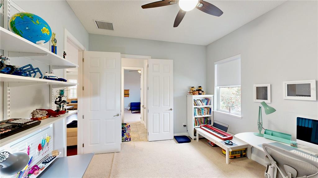 6219 Tiroco Way Windermere, FL 34786 - Photo 20 of 72 a room with furniture and toys