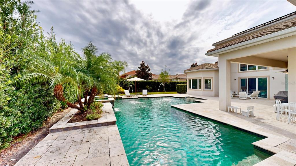 6219 Tiroco Way Windermere, FL 34786 - Photo 2 of 72 a view of a house with pool porch and furniture