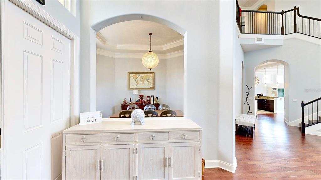 6219 Tiroco Way Windermere, FL 34786 - Photo 28 of 72 a en suite bathroom with a sink and a mirror