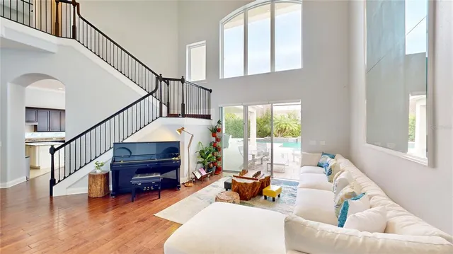 a large kitchen with a large counter top space and stainless steel appliances