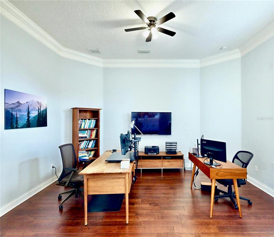 6219 Tiroco Way Windermere, FL 34786 - Photo 33 of 72 a work room with furniture and wooden floor