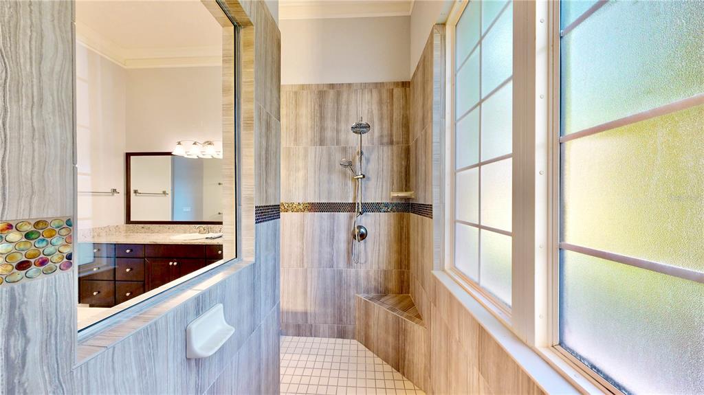 6219 Tiroco Way Windermere, FL 34786 - Photo 47 of 72 a bathroom with a tub and shower