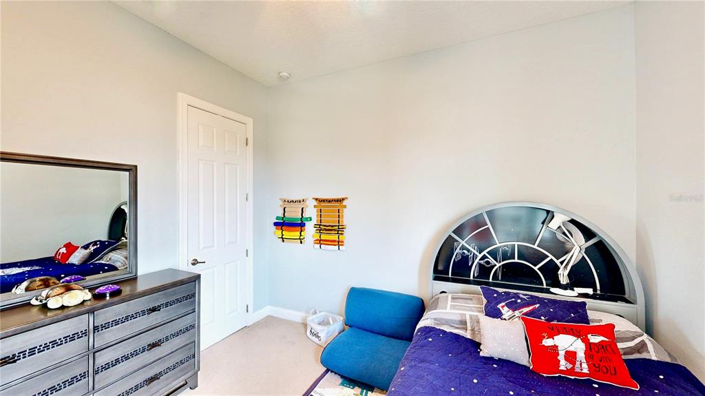 6219 Tiroco Way Windermere, FL 34786 - Photo 59 of 72 a living room with furniture and a wooden floor