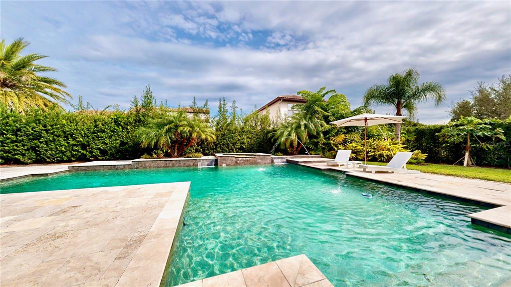 6219 Tiroco Way Windermere, FL 34786 - Photo 66 of 72 a view of a swimming pool with a yard