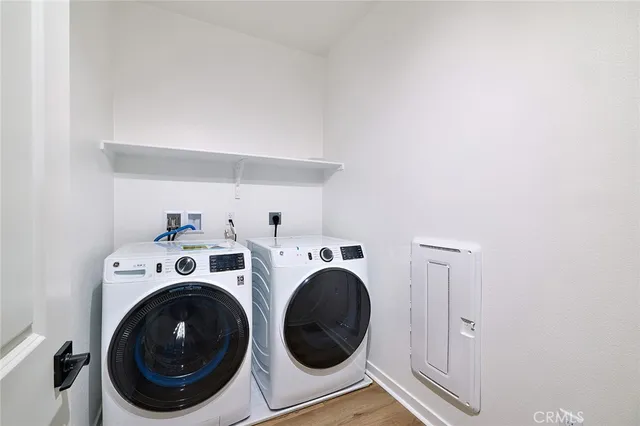 a view of a house with swimming pool and a yard