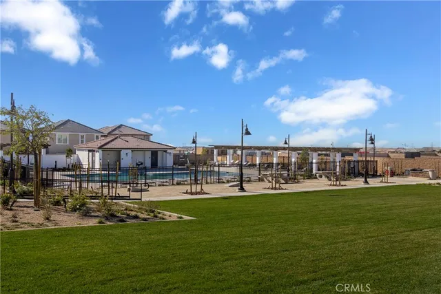 a view of a lake with a house in the background