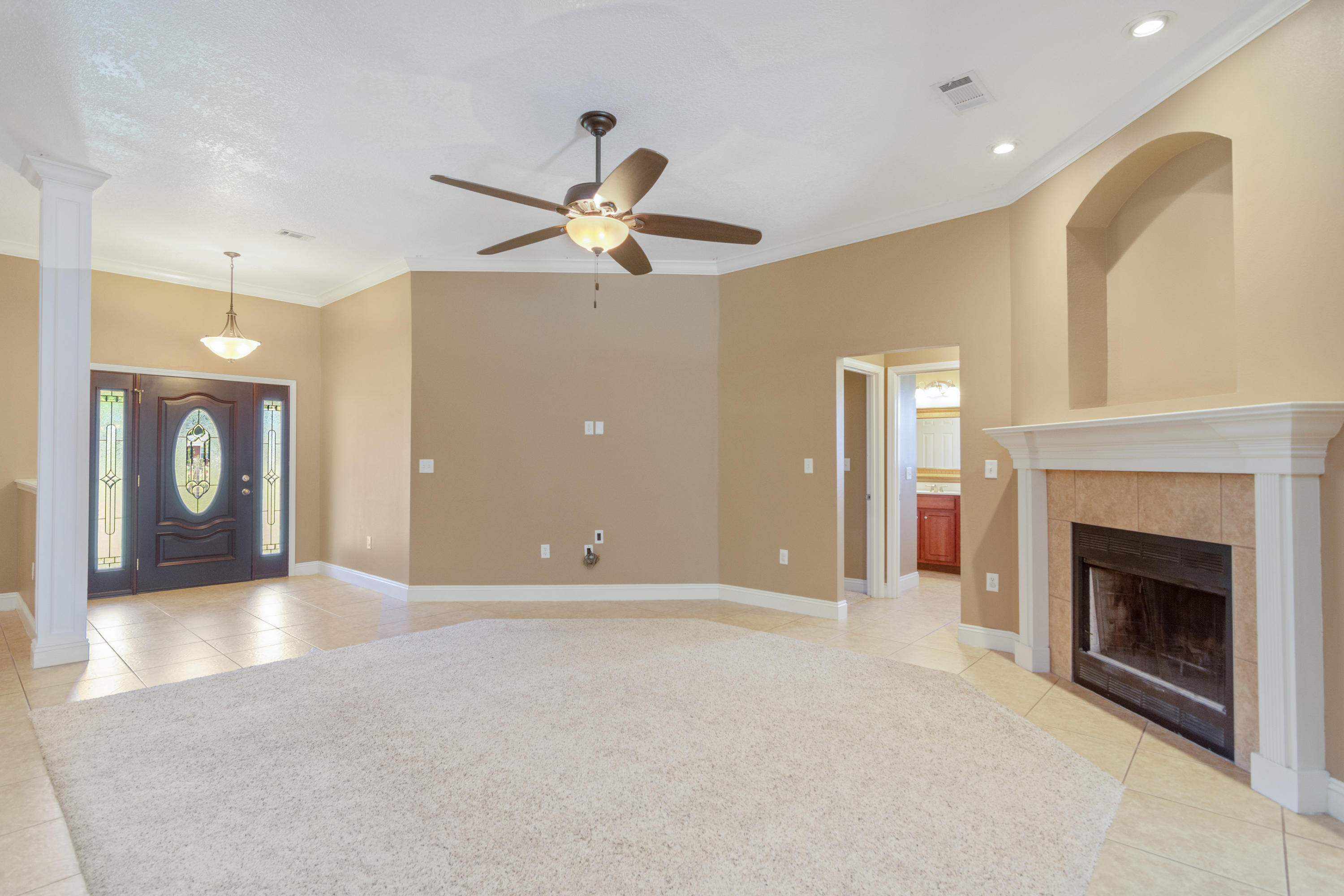 6589 Old River Road Baker, FL 32531 - Photo 13 of 49 a view of a livingroom with a fireplace
