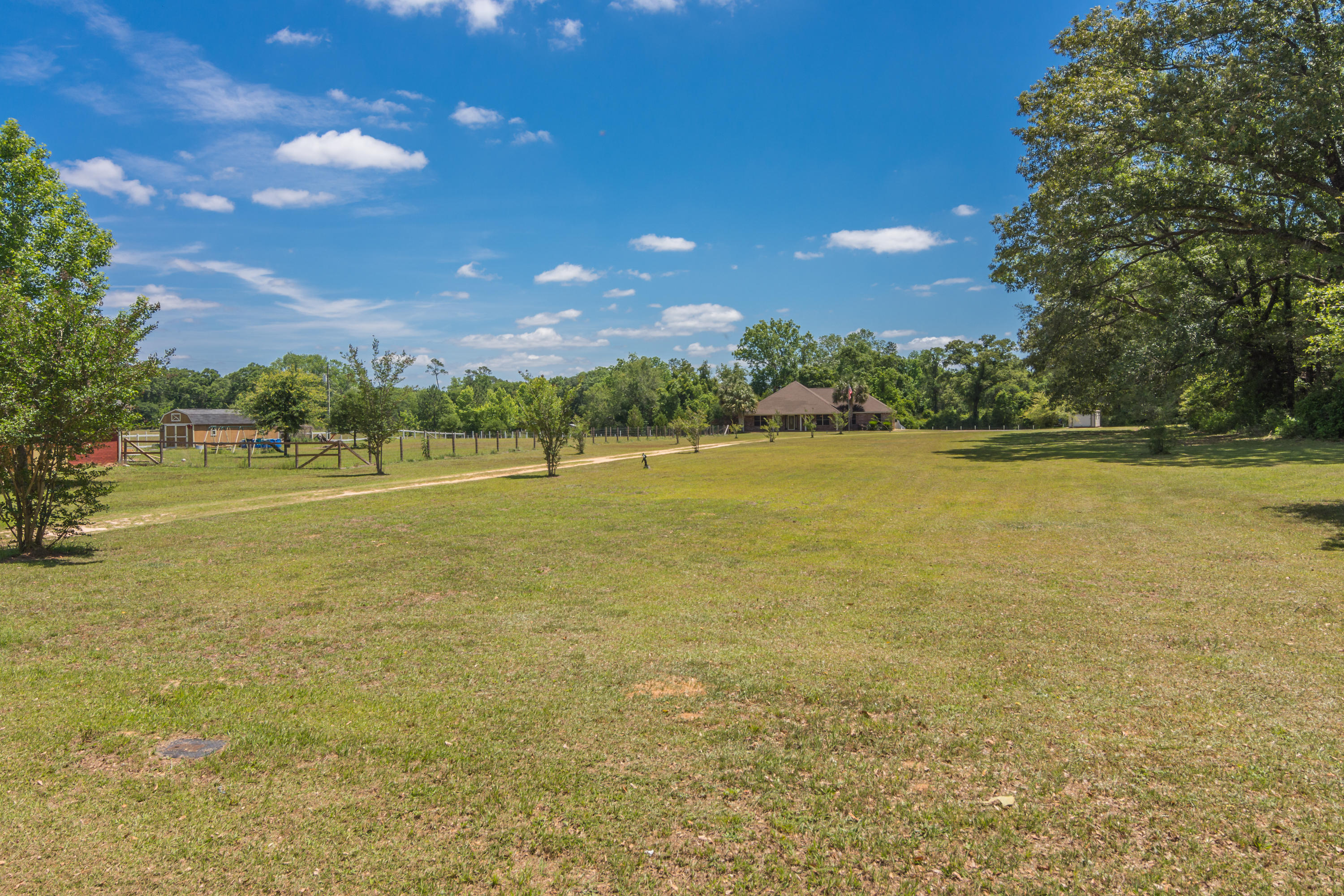 6589 Old River Road Baker, FL 32531 - Photo 7 of 49 a view of an ocean and beach