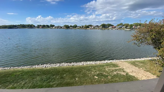 a view of a lake from a balcony