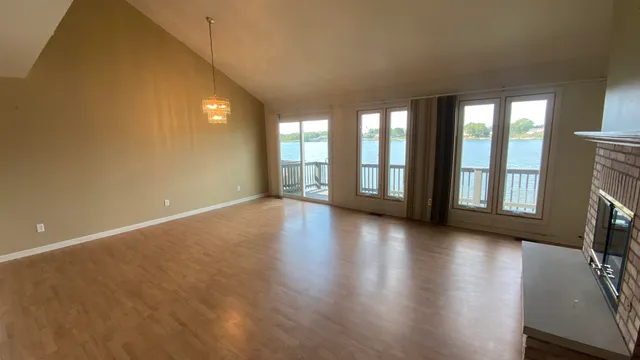 a kitchen with a refrigerator and a stove