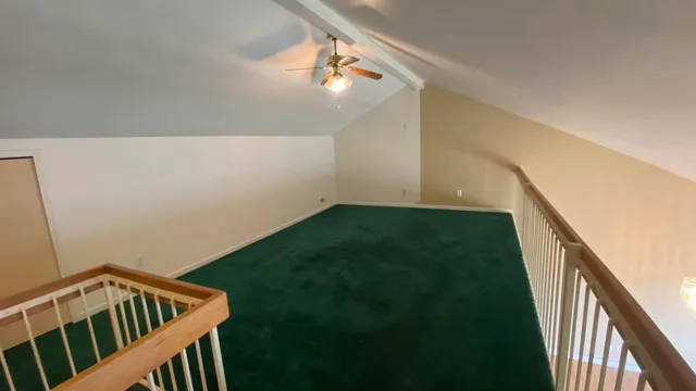 a view of chairs in an empty room