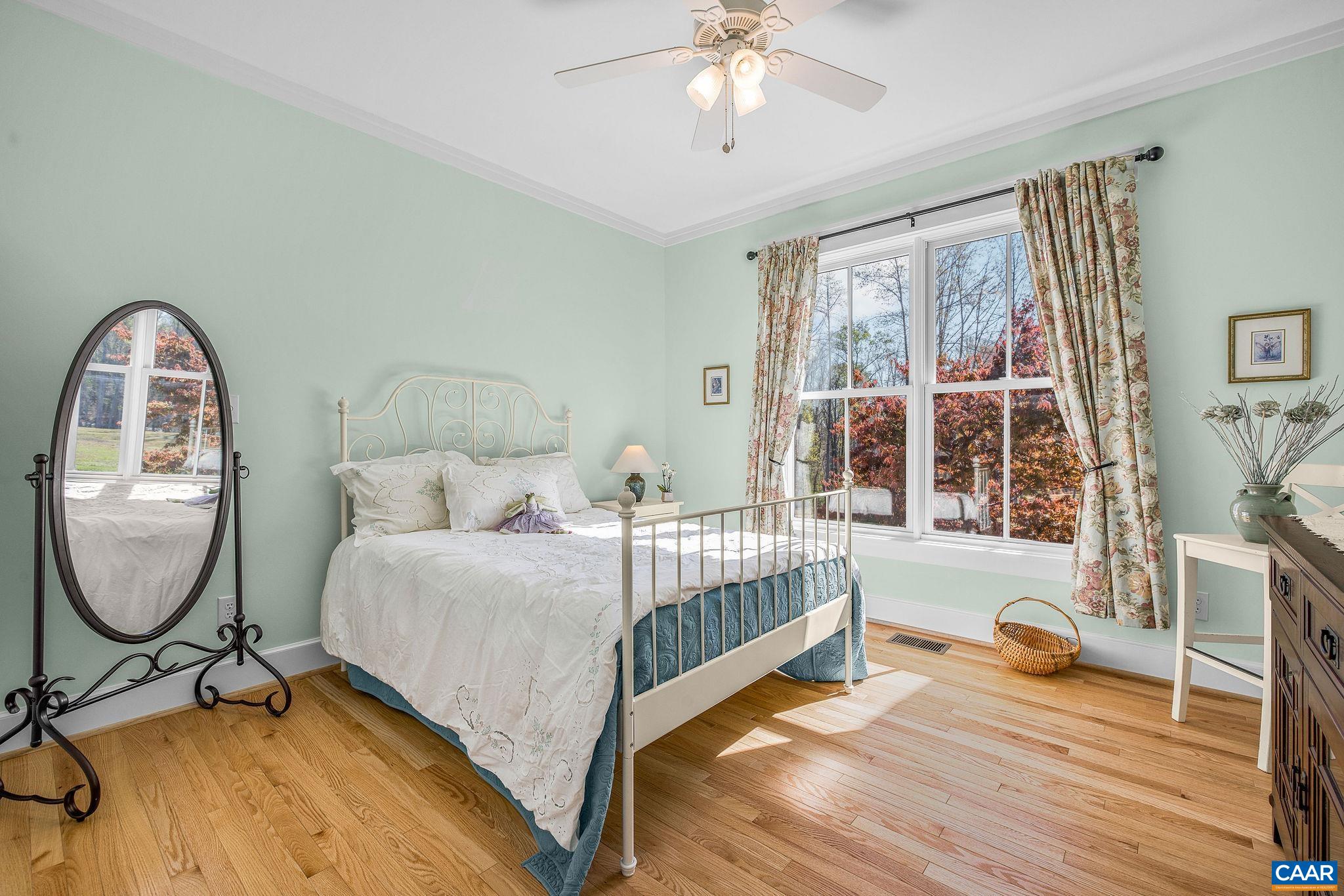 4764 Advance Mills Road Earlysville, VA 22936 - Photo 56 of 72 a bedroom with bed and a window