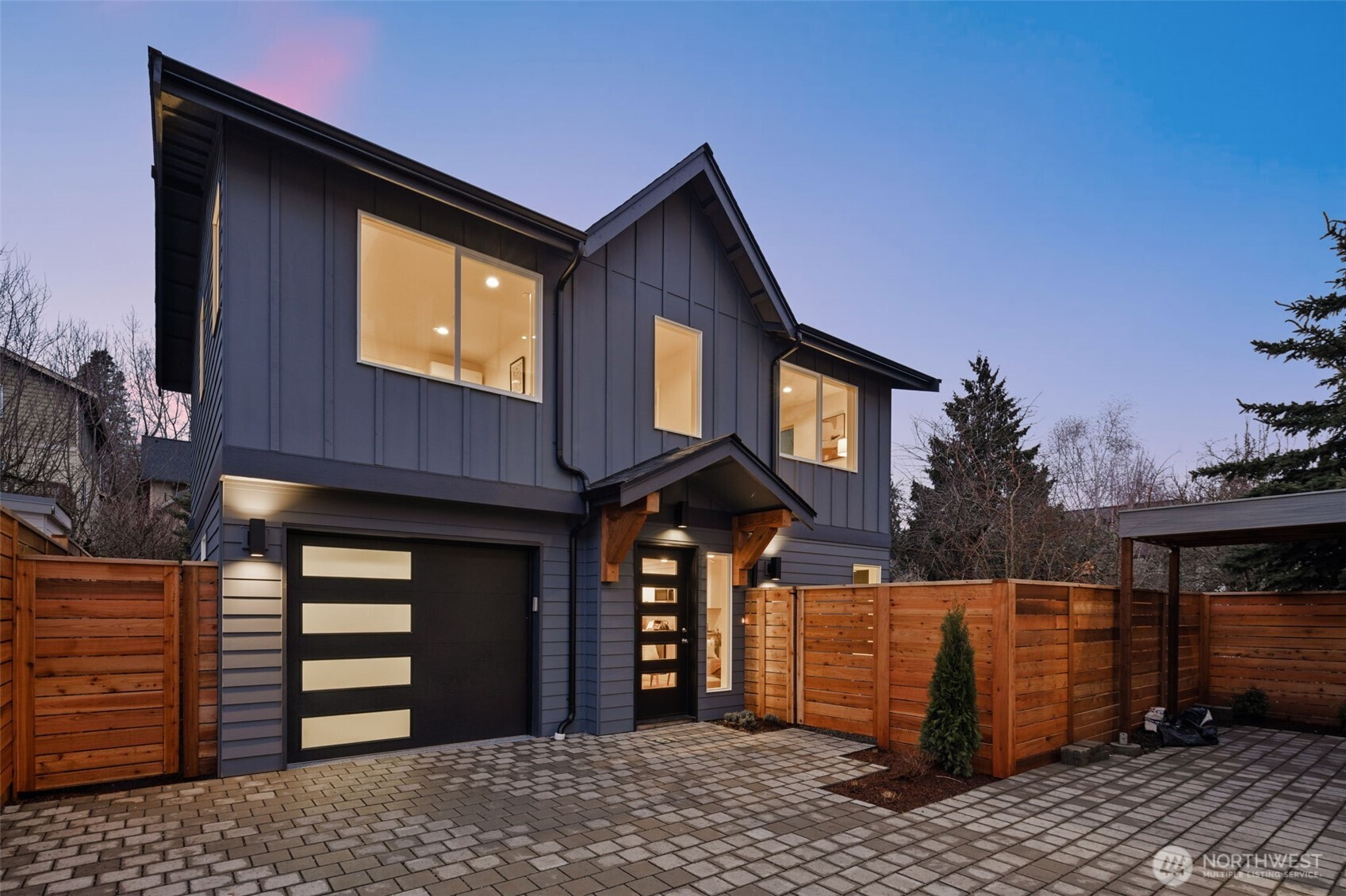 1109 26th Avenue South Seattle, WA 98144 - Photo 1 of 16 a front view of a house with a garage