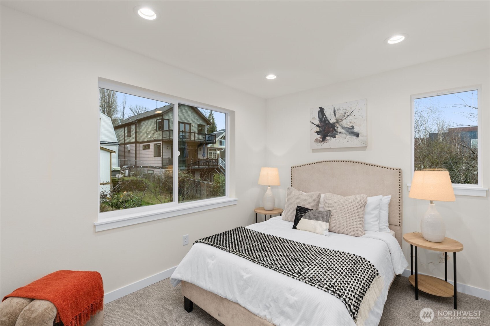 1109 26th Avenue South Seattle, WA 98144 - Photo 11 of 16 a bedroom with a bed and a window