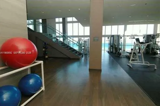 a view of a room with gym equipment