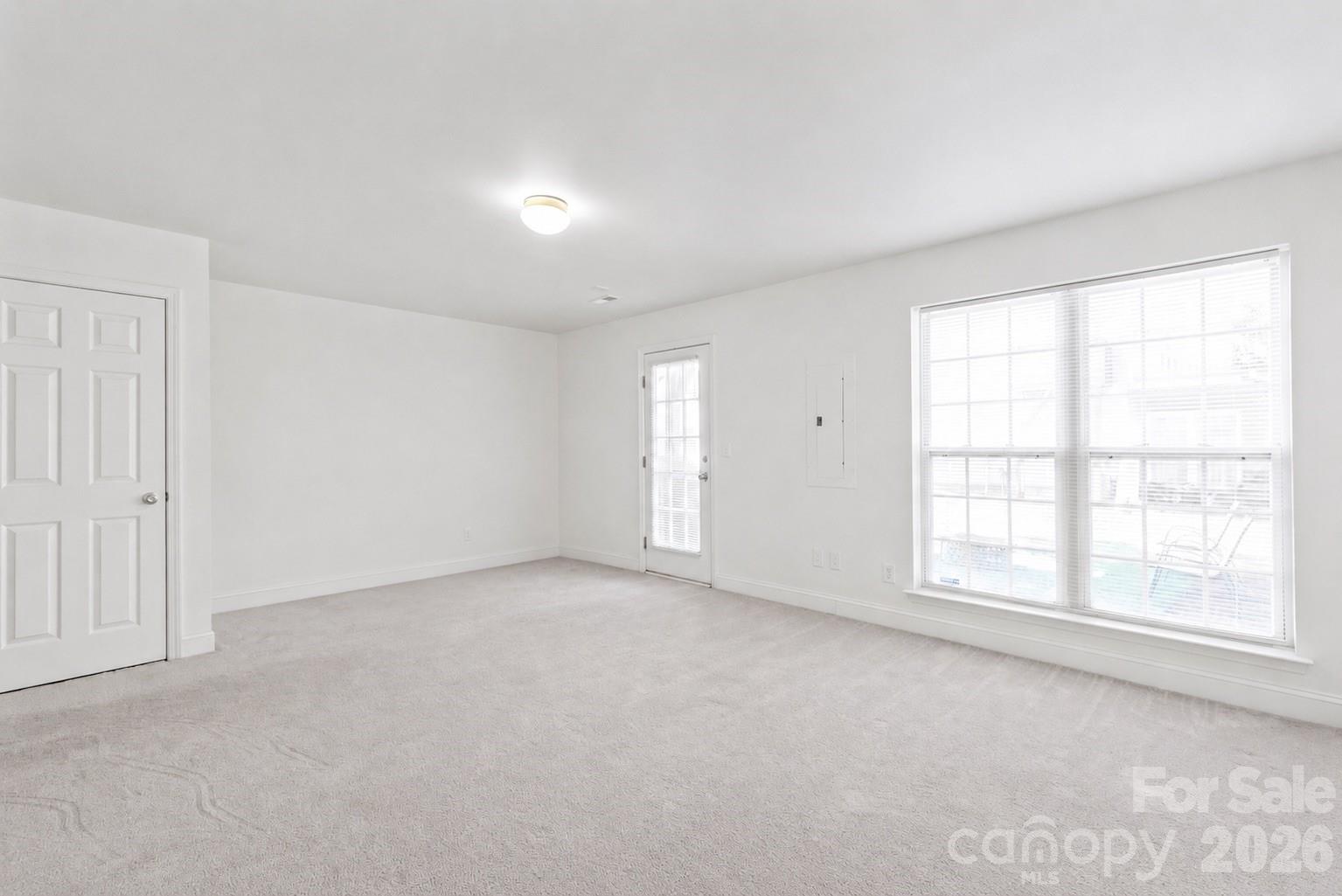 1707 Kashmir White Lane Fort Mill, SC 29708 - Photo 6 of 33 an empty room with windows