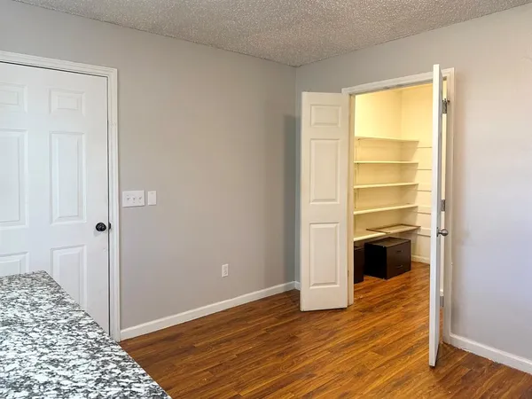 a kitchen with stainless steel appliances granite countertop a sink and a stove