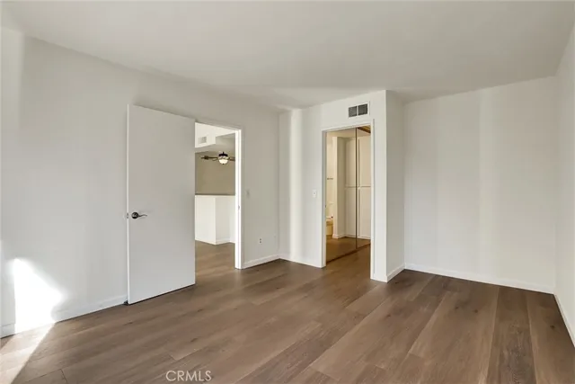 a bathroom with a shower and a toilet