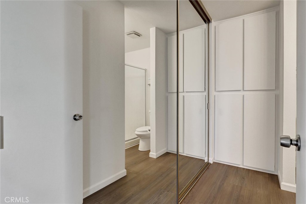 3000 Associated Road, Unit 60 Fullerton, CA 92835 - Photo 19 of 56 a bathroom with a shower and a toilet