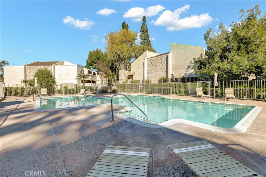 3000 Associated Road, Unit 60 Fullerton, CA 92835 - Photo 31 of 56 a view of a lake with a swimming pool