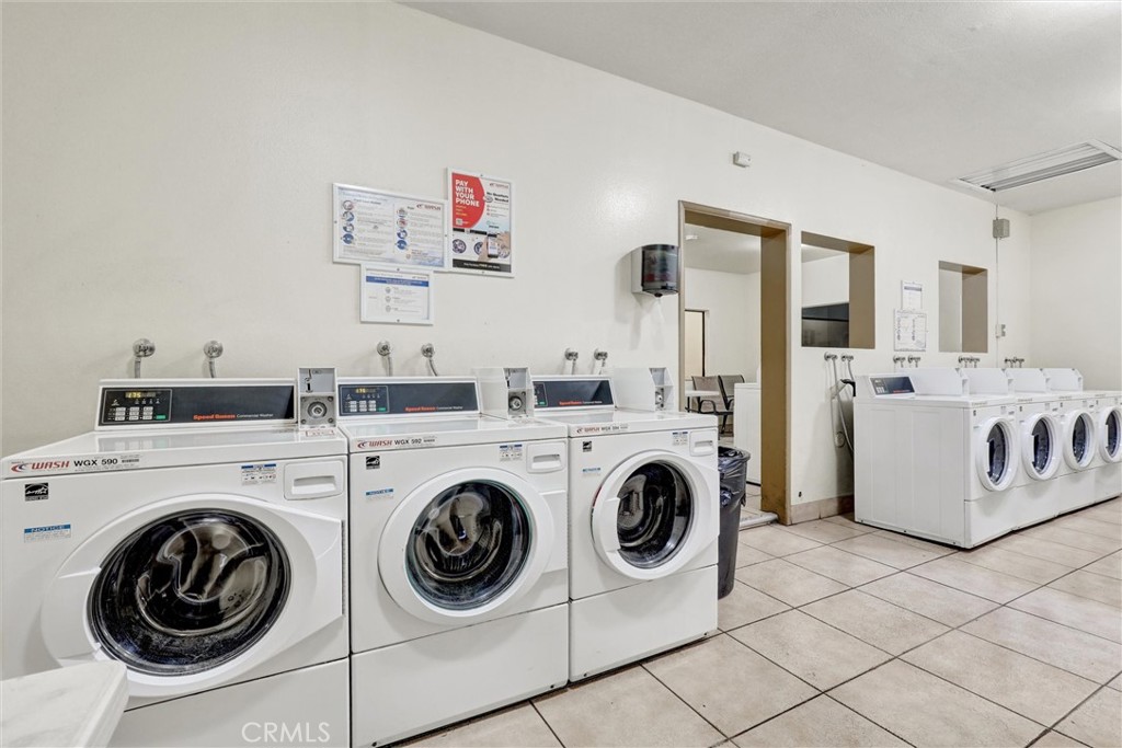 3000 Associated Road, Unit 60 Fullerton, CA 92835 - Photo 31 of 51 a utility room with dryer and washer