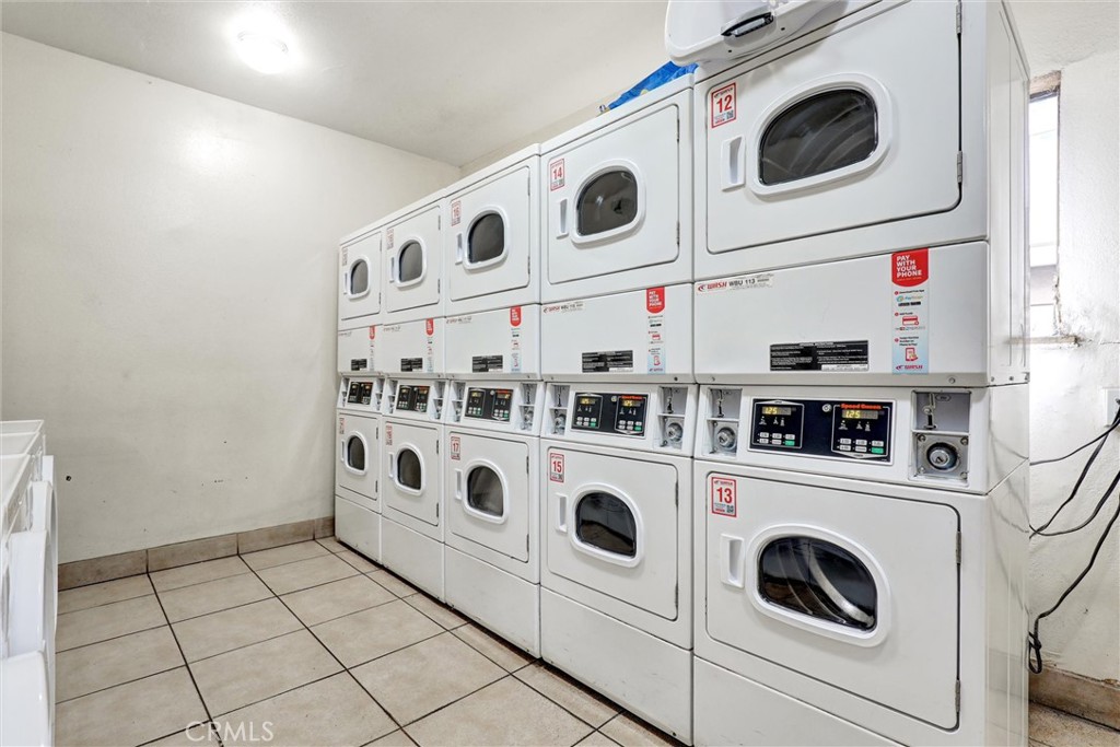 3000 Associated Road, Unit 60 Fullerton, CA 92835 - Photo 32 of 51 a utility room with dryer and washer