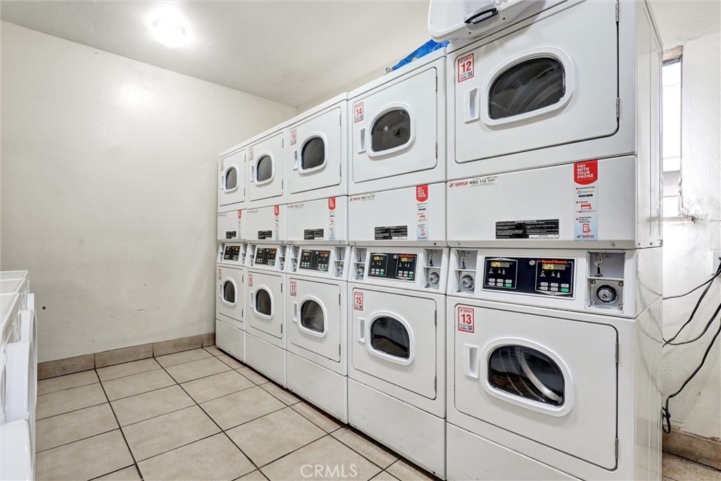 3000 Associated Road, Unit 60 Fullerton, CA 92835 - Photo 36 of 56 a utility room with dryer and washer