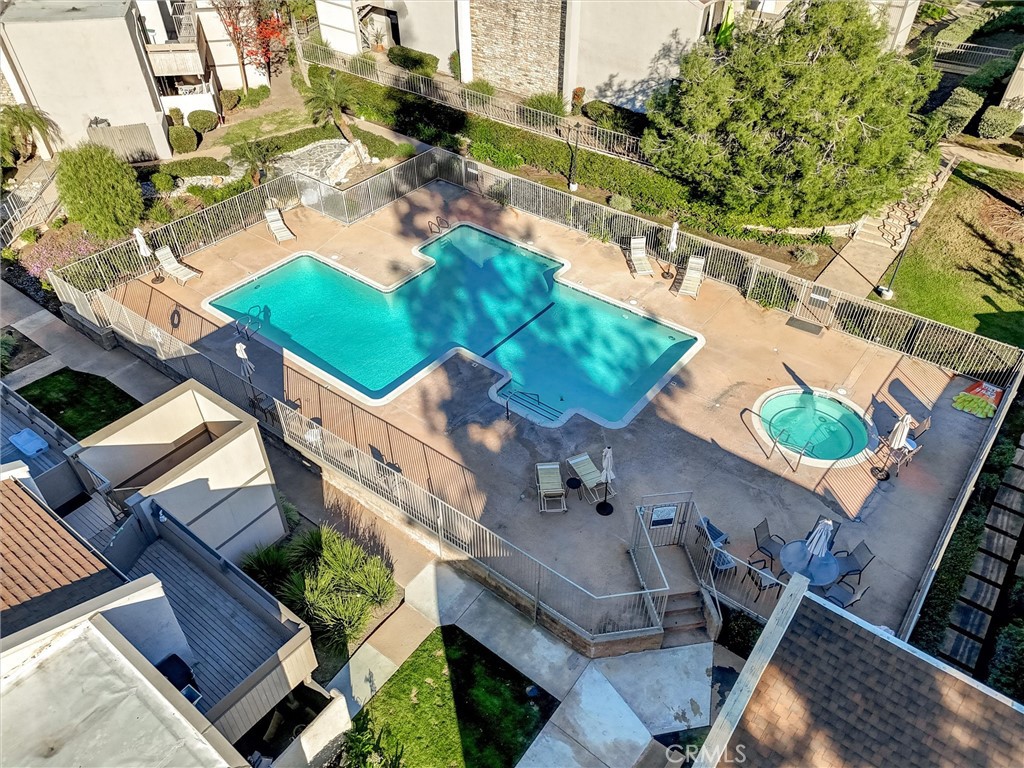 3000 Associated Road, Unit 60 Fullerton, CA 92835 - Photo 46 of 51 an aerial view of a house with a yard