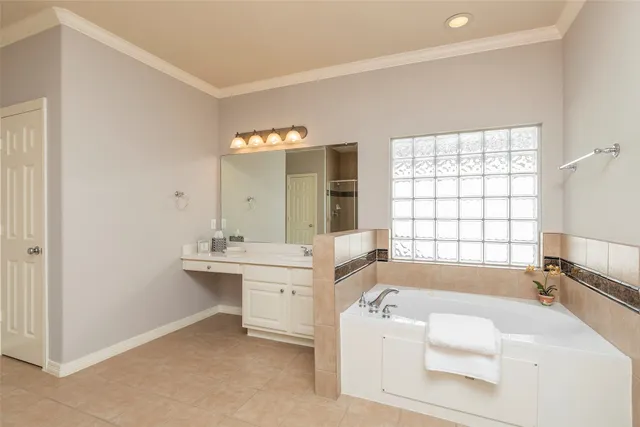 a bathroom with a shower and a sink