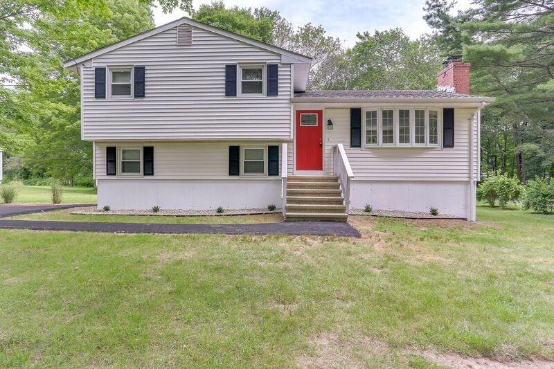 152 Cow Hill Road Clinton, CT 06413 - Photo 1 of 1 a front view of a house with a yard