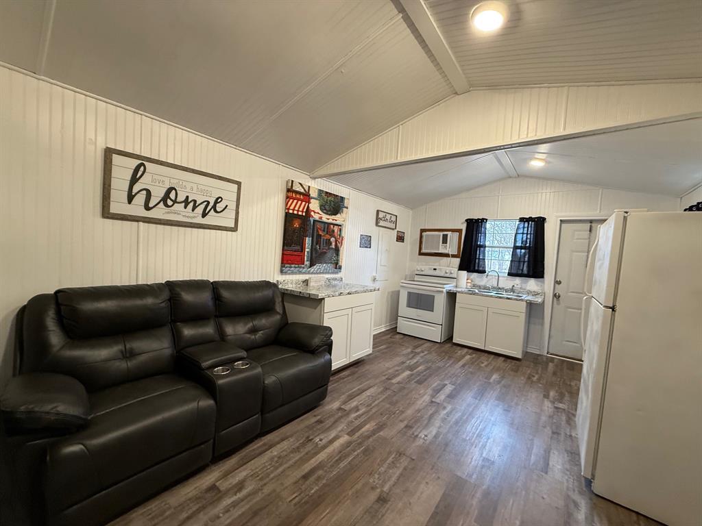 Tbd Tbd Tbd Port Comanche, TX 76442 - Photo 3 of 28 a living room with furniture and a wooden floor