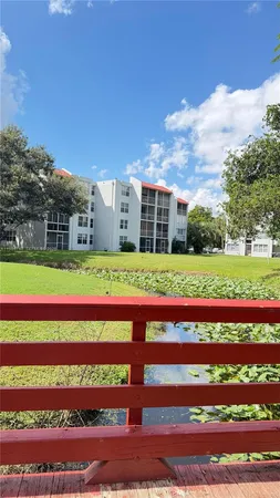 a view of a house with a big yard