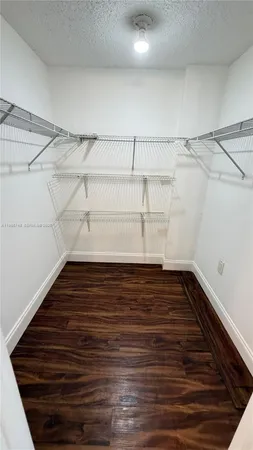 a view of a room with racks on the wall