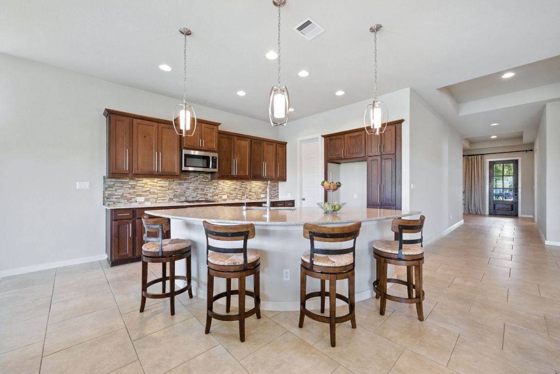 437 Pienza Drive Georgetown, TX 78628 - Photo 15 of 32 open, spacious kitchen