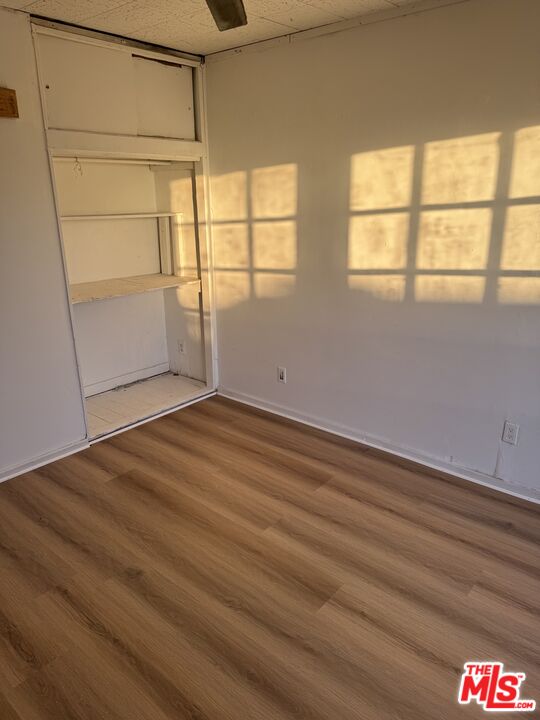 4908 Fort Tejon Road Palmdale, CA 93552 - Photo 19 of 21 an empty room with a window