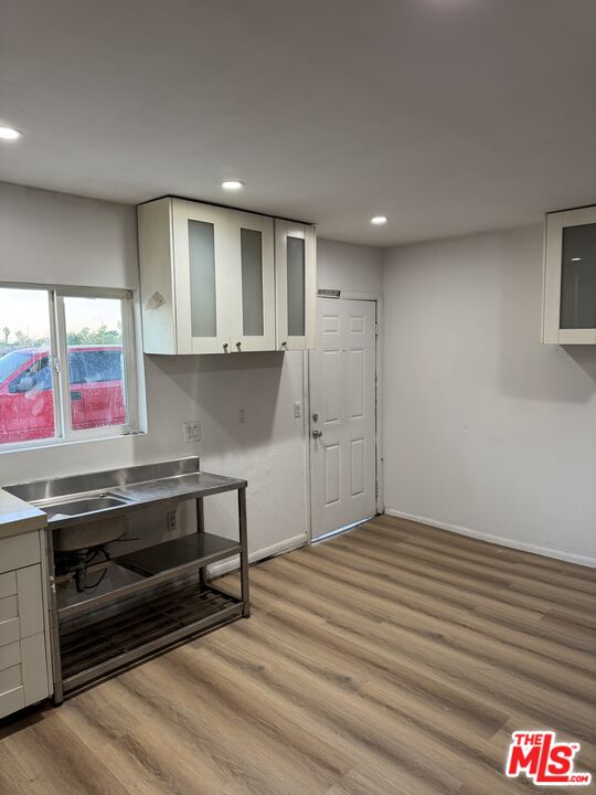 4908 Fort Tejon Road Palmdale, CA 93552 - Photo 7 of 21 a view of kitchen and utility room
